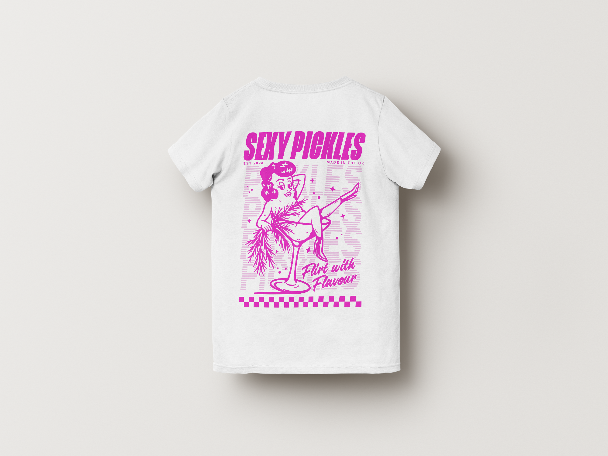 White t-shirt with pink graphic design on a light gray background